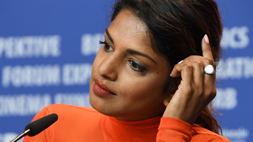 M.I.A. seated at a panel