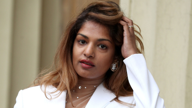 Rapper and singer M.I.A. with her MBE following an investiture ceremony at Buckingham Palace on January 14, 2020 in London, United Kingdom.