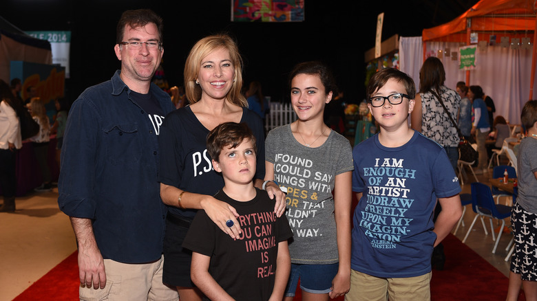 Sutton Stracke poses with her family