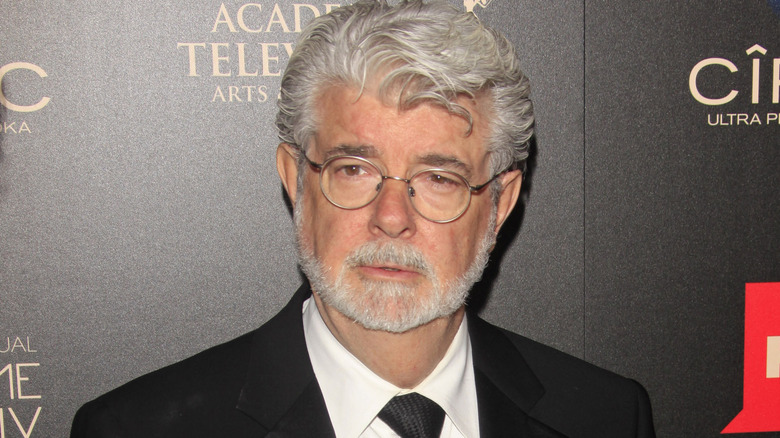 George Lucas looks on