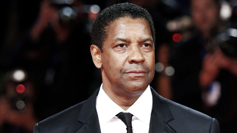 Denzel Washington looks on