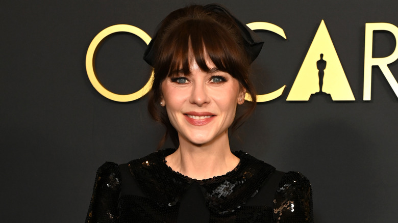 Zooey Deschanel wearing a black sequin dress