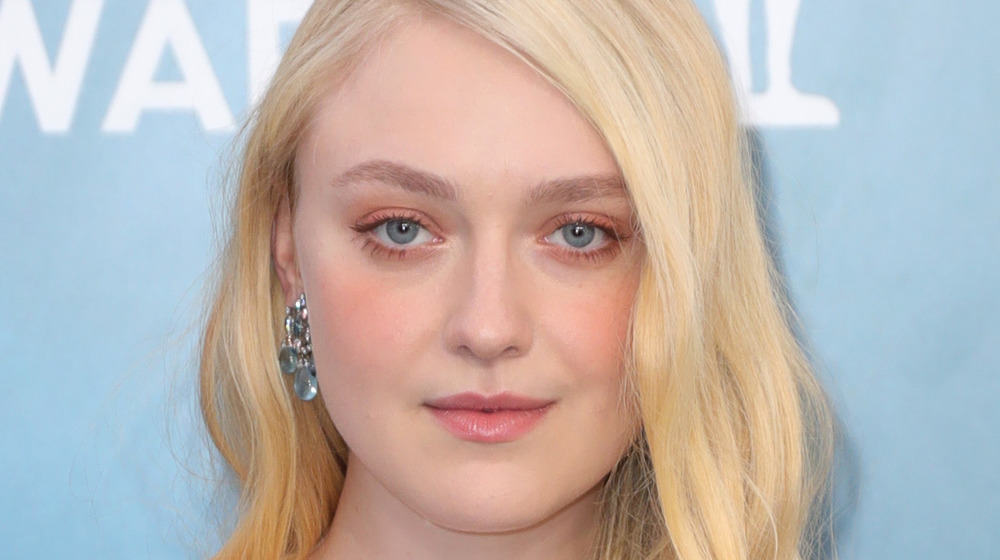 Dakota Fanning, as an adult, 2020, not smiling, dressed up, red carpet, glam, hair long and down