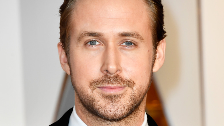 Ryan Gosling slight smile blue eyes