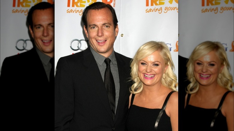 Will Arnett and Amy Poehler laughing 