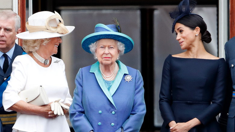 Camilla, Queen Elizabeth, and Meghan Markle chatting