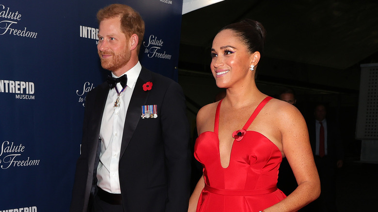 Prince Harry and Meghan Markle smiling