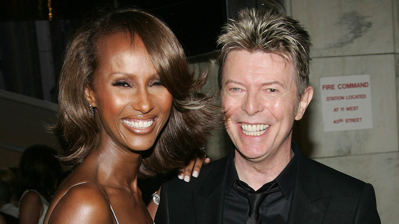 Iman and David Bowie smiling