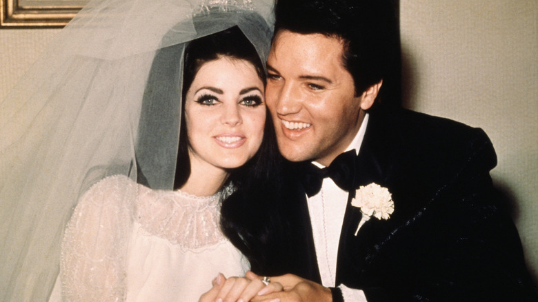 Priscilla Presley and Elvin Presley smiling