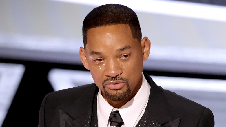 Will Smith accepting the Actor in a Leading Role award for 'King Richard' onstage during the 94th Annual Academy Awards