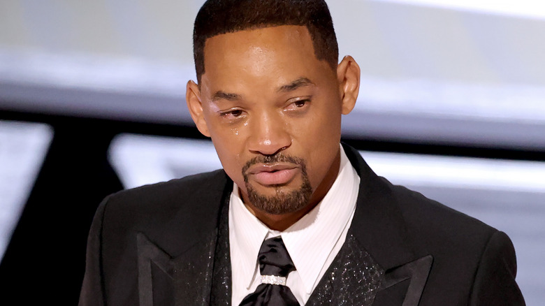 Will Smith cries onstage at the Oscars