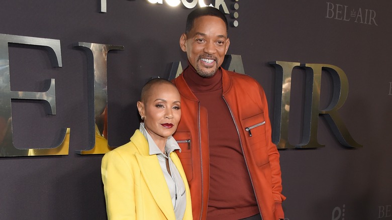 Jada Pinkett Smith and Will Smith posing