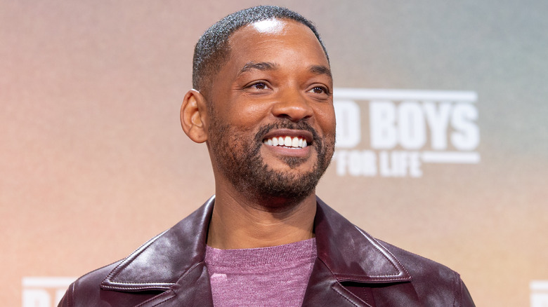 Will Smith wearing purple leather jacket