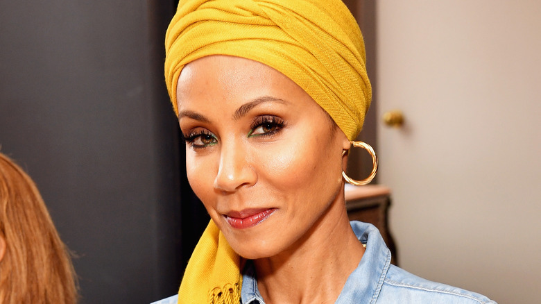 Jada Pinkett Smith posing in headscarf