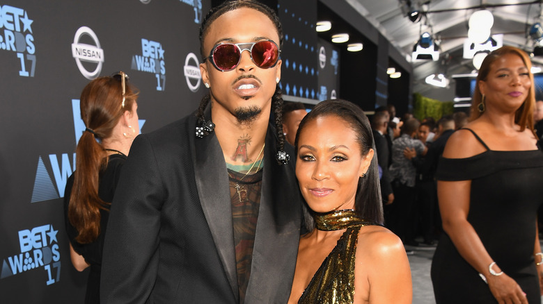 August Alsina and Jada Pinkett Smith on red carpet