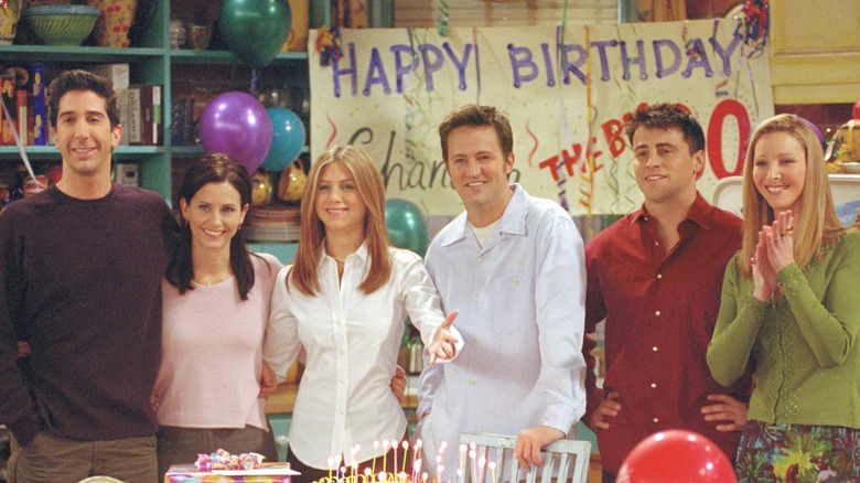 Cast of 'Friends' smiling on-set