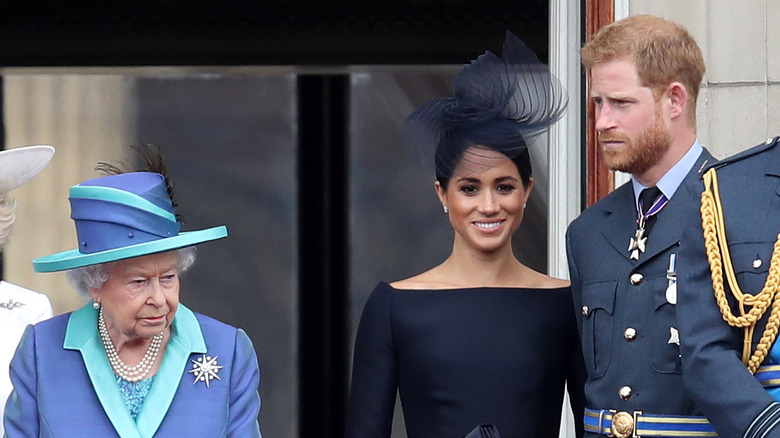 Queen Elizabeth, Meghan Markle, and Prince Harry