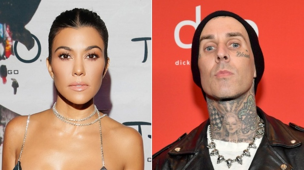 Kourtney Kardashian, Travis Barker, posing