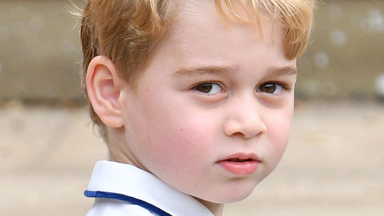 Prince George posing of for a photograph