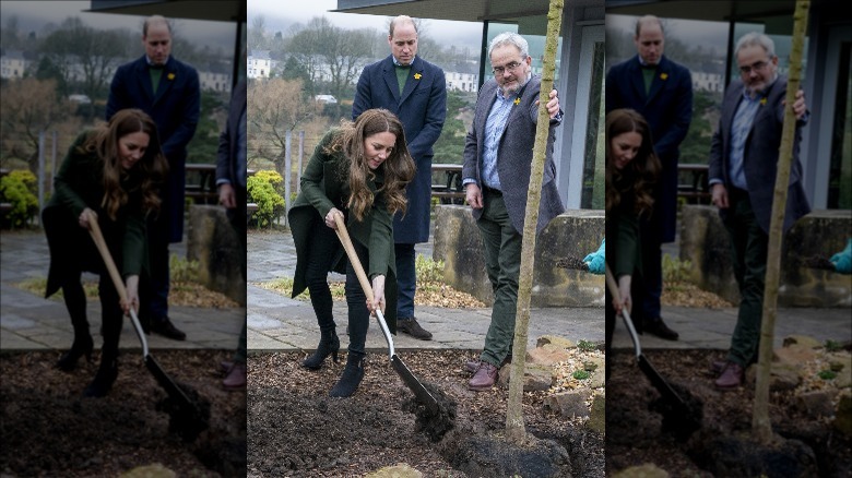 Kate Middleton planting a tree as Prince William observes