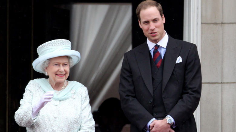 Prince William smiles with Queen Elizabeth II