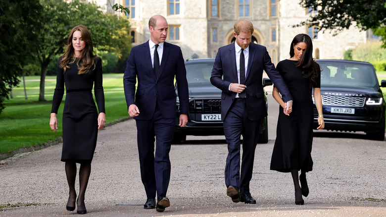 Kate Middleton, Prince William, Prince Harry, and Meghan Markle walking