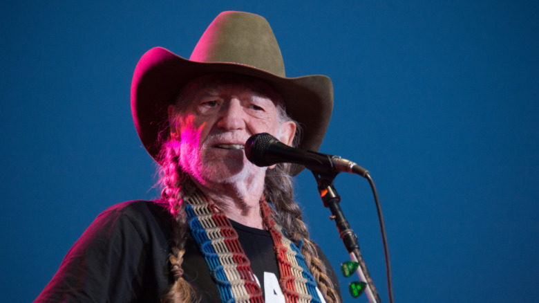 Willie Nelson performing 