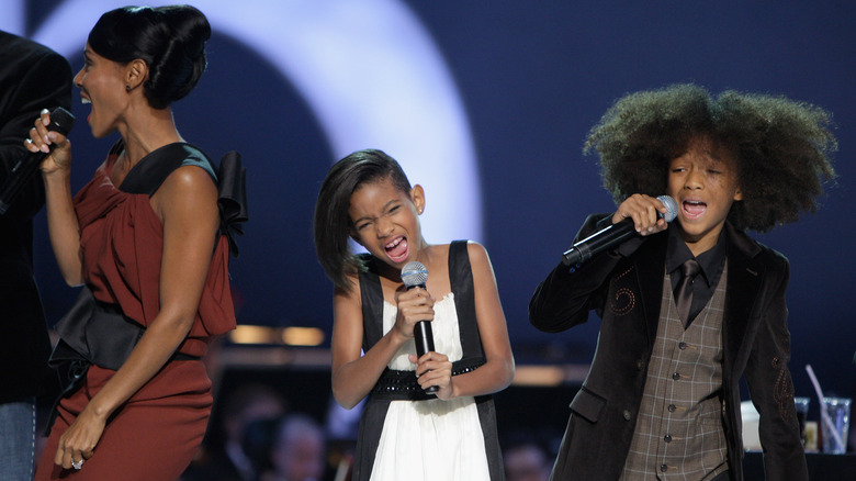 Jada Pinkett, Willow, and Jaden Smith singing