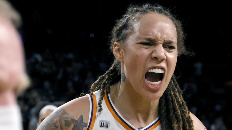 Brittney Griner on the basketball court mouth open