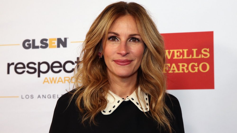 Julia Roberts in black shirt with white collar