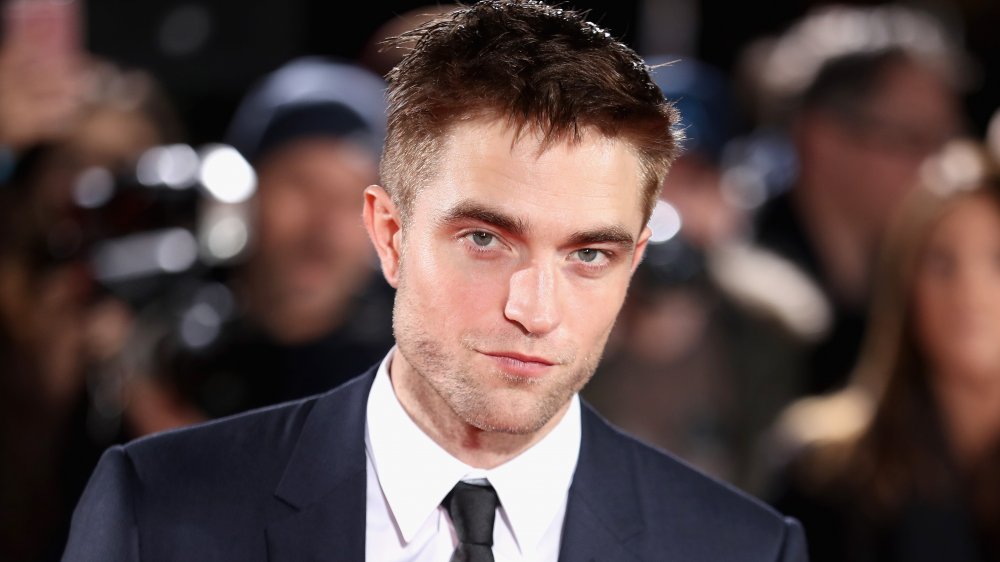 Robert Pattinson gazing at camera