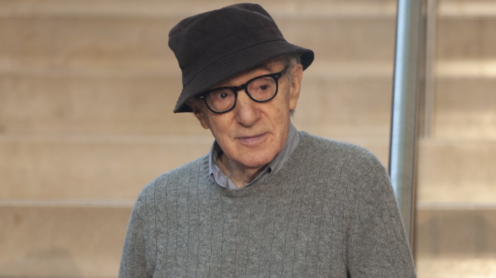 Woody Allen in bucket hat and grey sweater 