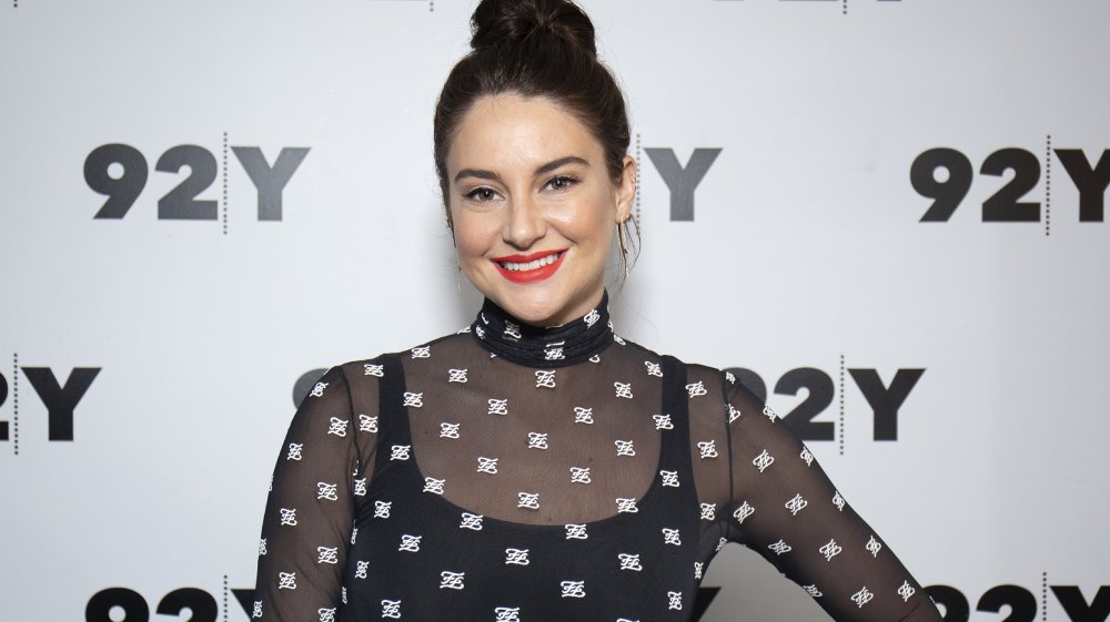 Shailene Woodley in a mesh dress and red lipstick