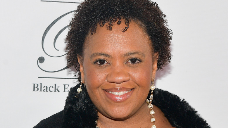 Chandra Wilson head tilted smiling at camera