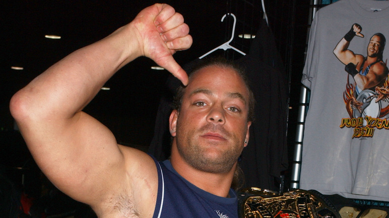 Rob Van Dam posing with belt