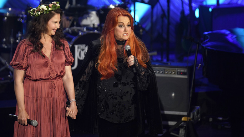 Wynonna Judd and Ashley Judd on stage 