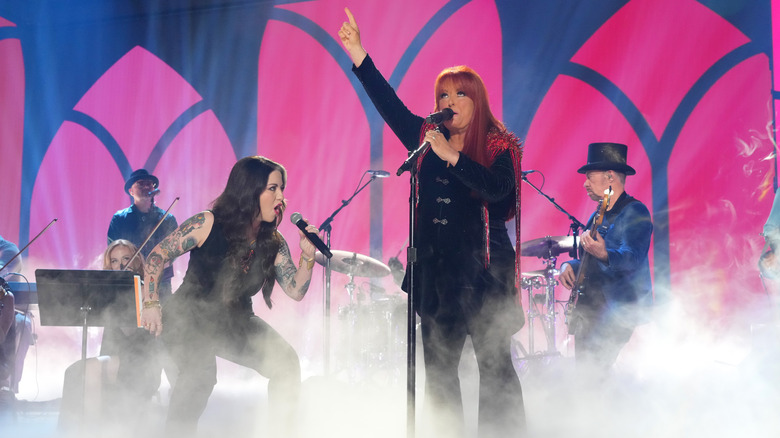 Ashley McBryde and Wynonna Judd performing