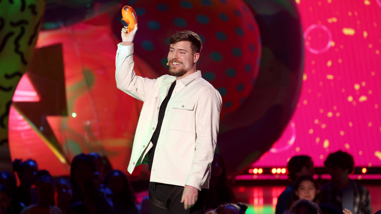 Mr Beast holding an award