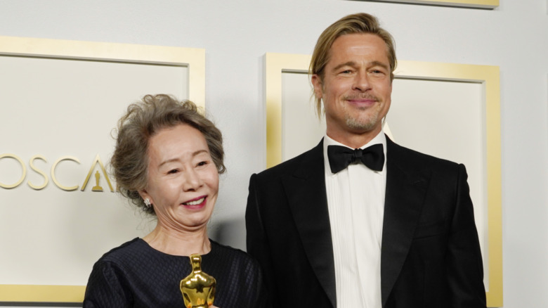 Yuh-Jung Youn and Brad Pitt at the 93rd Annual Academy Awards