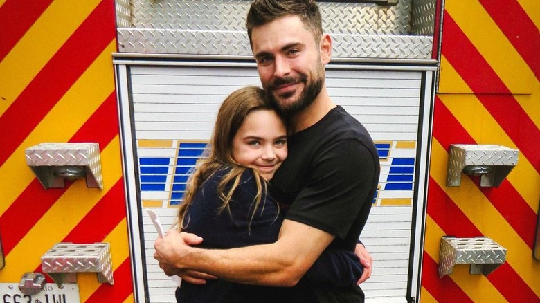 Zac Efron hugs Ryan Kiera Armstrong