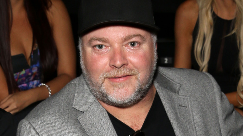 Kyle Sandilands posing in 2014