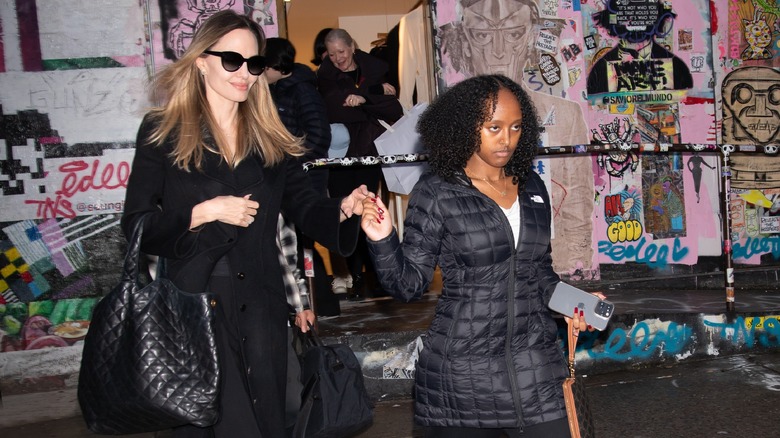 Angelina Jolie holds hands with Zahara