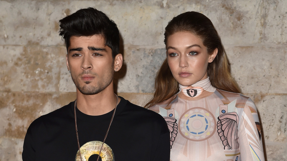 Zayn Malik and Gigi Hadid pose together at an event