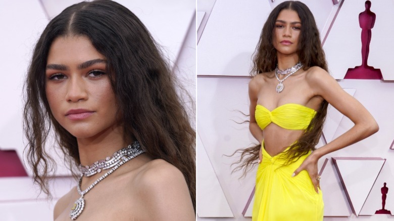 Zendaya posing on the Oscars red carpet