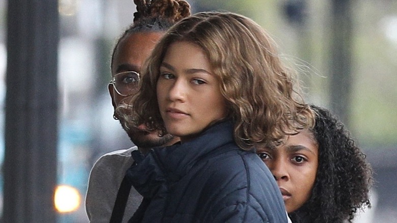 Zendaya with a neutral expression