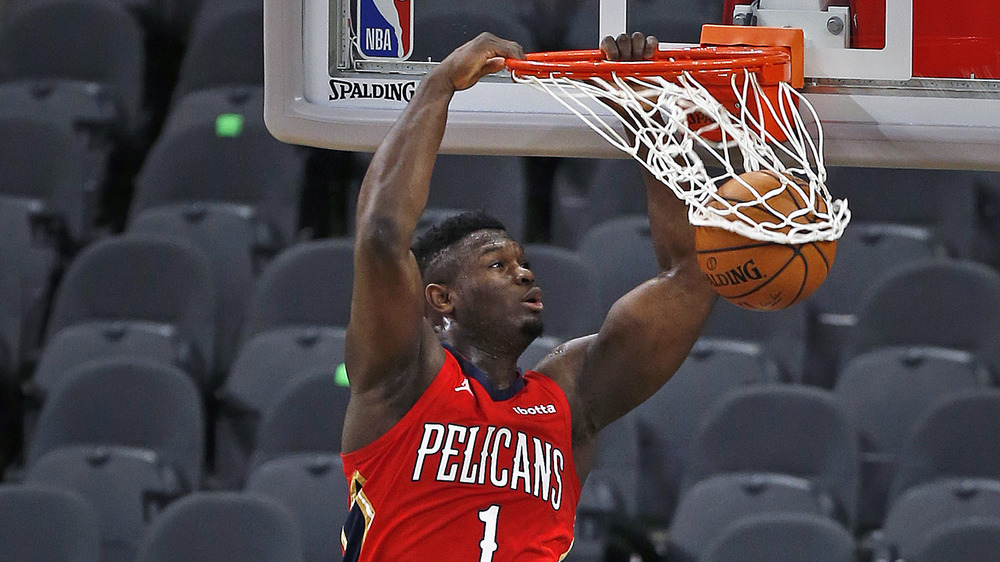 Zion Williamson slam dunking