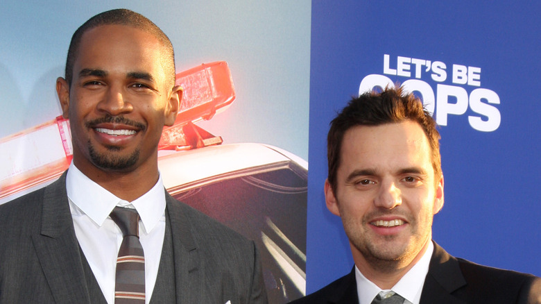 Damon Wayans Jr. and Jake Johnson smiling