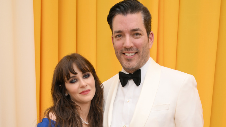 Zooey Deschanel and Jonathan Scott in formal wear