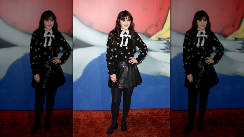 Zooey Deschanel wearing black and white